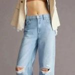 SNACKS from Mother The Fun Dip Puddle Sliced Size 25 Mid Rise Loose Light Wash Blue Photo 0