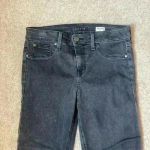 Anthropologie level 99 mid rise Liza black skinny jeans in size 28 Photo 1