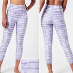 Athleta  Elation printed capri legging Tahiti dusk purple size small Photo 1