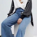 Free People  Auxton Thermal Wrap Top with a floral print Photo 0