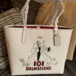 Coach Authentic Pebbled leather/signature coated canvas Cruella snap magnet tote Photo 0