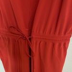 Athleta  Orange V-Neck Jumpsuit NWT sz 14 Photo 1