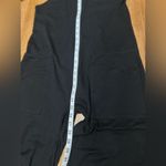 Racer back onesie NWOT black long pants two pockets adj straps sz small Photo 1