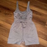 Cris cross bodysuit purple color Small Photo 1