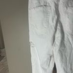 American Eagle Womenโs Size 0R White Skinny Jeans Distressed Ripped Knees Photo 8