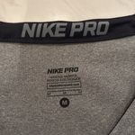 Nike Pro Women's Short Sleeve Gray Tee Photo 1