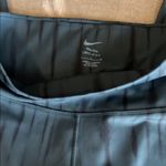 Nike  Teal and Navy Striped Leggings Size L‎ Photo 6