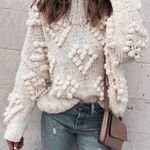 Chicwish  Knit Your Love Heart Pom Turtleneck Sweater in White Photo 0