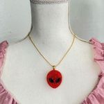 Hot Topic Red Alien resin Pendant Necklace Photo 0