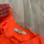 Crosby Bright Melon Orange One Shoulder Top with Ruffle and Pom Photo 1