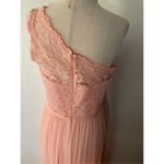 David's Bridal David’s bridal bridesmaid dress size 8 color is pink orange long with a slit Photo 3