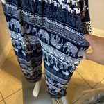 New Women’s dark Navy Blue jumpsuit size L/XL for size 14 New with tags Straps are adjustable Stretchy with front pockets Photo 8