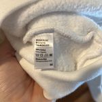 “Raising legends” mama white purple writing crewneck sweatshirt Size M Photo 2