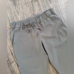  Lululemon On the Fly 7/8 Pant *Woven- Grey Sage- Size 10 Photo 4