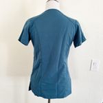 Marilyn Monroe  Teal Short Sleeve V-Neck Top Photo 1