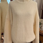 Isalis  Cozy Cream Knit Turtleneck Sweater Photo 0