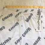Refuge Womens all over print Blessed joggers in white/black size Small Photo 4