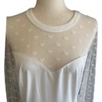Allegra K NWT--WOMENS XL-EHITE FIT AND FLARE DRESS Stunning white fit and flare dress, women’s heart mesh long sleeve dress, heart mesh long sleeves, keyhole one button back, 95% polyester, 5% spandex, brand new with tags Measurements for xl is  37 length  41.3 bust 35.4 waist  Photo 5