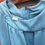 Long vintage dress.Runs small but stretch Photo 4