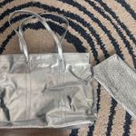 Clinique 🆕 Shimmering Silver Tote with Geometric Pouch Photo 0