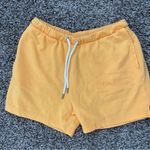 H&M  orange sweatshorts Photo 2