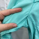 Under Armour  women's turquoise heat gear‎ long sleeve active button zip shirt M Photo 3