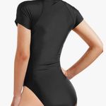 Live a Little Women's One Piece Short Sleeve Black Rash Guard Surfing... Photo 1