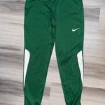Nike Women’s Dri Fit Green & White Athletic Stretch Pants Gym Workout Leggings Photo 0