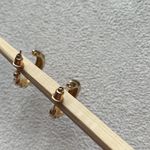 Urban Outfitters Twisted open hoop earrings Photo 5