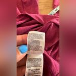 The North Face  women’s long sleeve size medium Photo 3