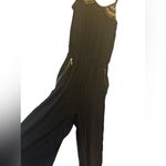 XOXO  black jumpsuit gold studs purple sequin thon strap zip pockets wide leg Photo 3
