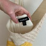 Bebe  Cream and Yellow Ruched Halter Bodycon Dress Photo 2