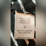 Charming Charlie ’s- Black and white striped shirt Size M‎ Photo 3