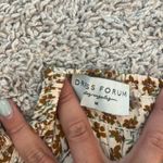 Dress Forum  tan floral print mini skirt Sz M Photo 1