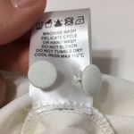 CROSBY by Mollie Burch • Cream Ruffled Flowy Top Size Small Photo 4