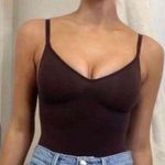 SKIMS  Low Back Sculpting Thong Bodysuit Photo 0