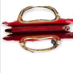 Zebra style print with red and gold accents shoulder tote purse. Patent leather Black Photo 3