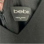 Bebe  Women's XL Black V-Neck Jumpsuit with Open Leg Slits Photo 5