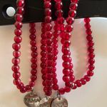 PAMA Pomegranate Liqueur Red Promotional Bracelet Charm is Silver logo Red Photo 1