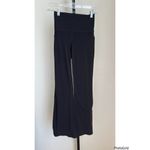 Athleta Salutation Stash Flare Pants Black XS Photo 1