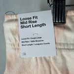 Nike  Women’s Loose Fit Mid Rise Short Length Tie Dye Print Shorts Size Medium Photo 2