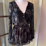 ASTR  Black and White Floral Romper with Bell Sleeves Photo 2