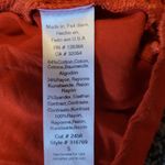 Urban Outfitters  LEFT OF CENTER ORANGE MIXED MEDIA LS ASYMMETRICAL SHIRT S Photo 11