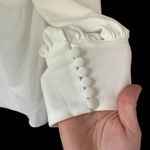 Azazie  Elegant White Long Sleeve Square Neck Wedding Dress with Button Detailing Photo 8