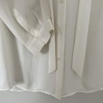Loft  cream 3/4 sleeve blouse with a few stains in size Small Photo 3