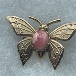 Vintage gold colored butterfly with a pink agate. Gold Photo 0