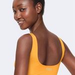 PINK - Victoria's Secret PINK Victoria’s Secret | Ultimate Scoop Gold Glow Yellow Sports Bra Photo 1