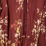 ASTR NWT Floral cold shoulder long sleeve romper Photo 3