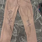 American Eagle mauve ripped jeans Photo 0