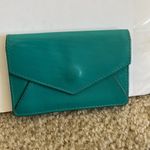 Oakley Teal soft smooth leather snap button mini coin purse cardholder tiny bag Photo 0